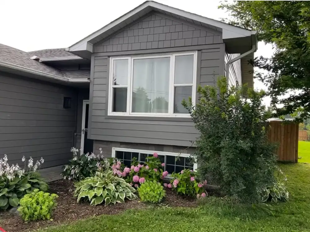 Exterior siding installation in progress